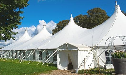 high-quality portable toilets stationed at a wedding, meeting the needs of guests throughout the outdoor reception in Black Mountain